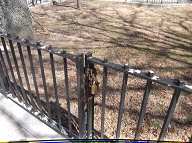 The kids like to swing on this gate while their mothers drink booze in the only entranceway to this building!! I wonder how long it will take this time to get the lock put back on again??