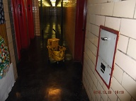 Our No Show NYCHA Caretaker Was On The Third Floor Of Stairway " B " Using A Mop And Left Her Bucket In The Middle Of The Second Floor Hallway Blocking My Way To Empty My Trash Into The Trash Chute !!