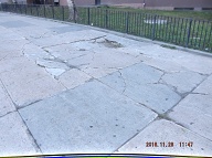 THE BROKEN AND CRATERED N.Y.C.H.A. SIDEWALK BETWEEN 456 - 478 RICHMOND TERRACE STILL HAS NOT BEEN FIXED YET AFTER ALL THESE MANY MANY YEARS!!
